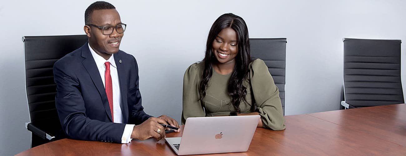 Nations Realty professionals reviewing property information together