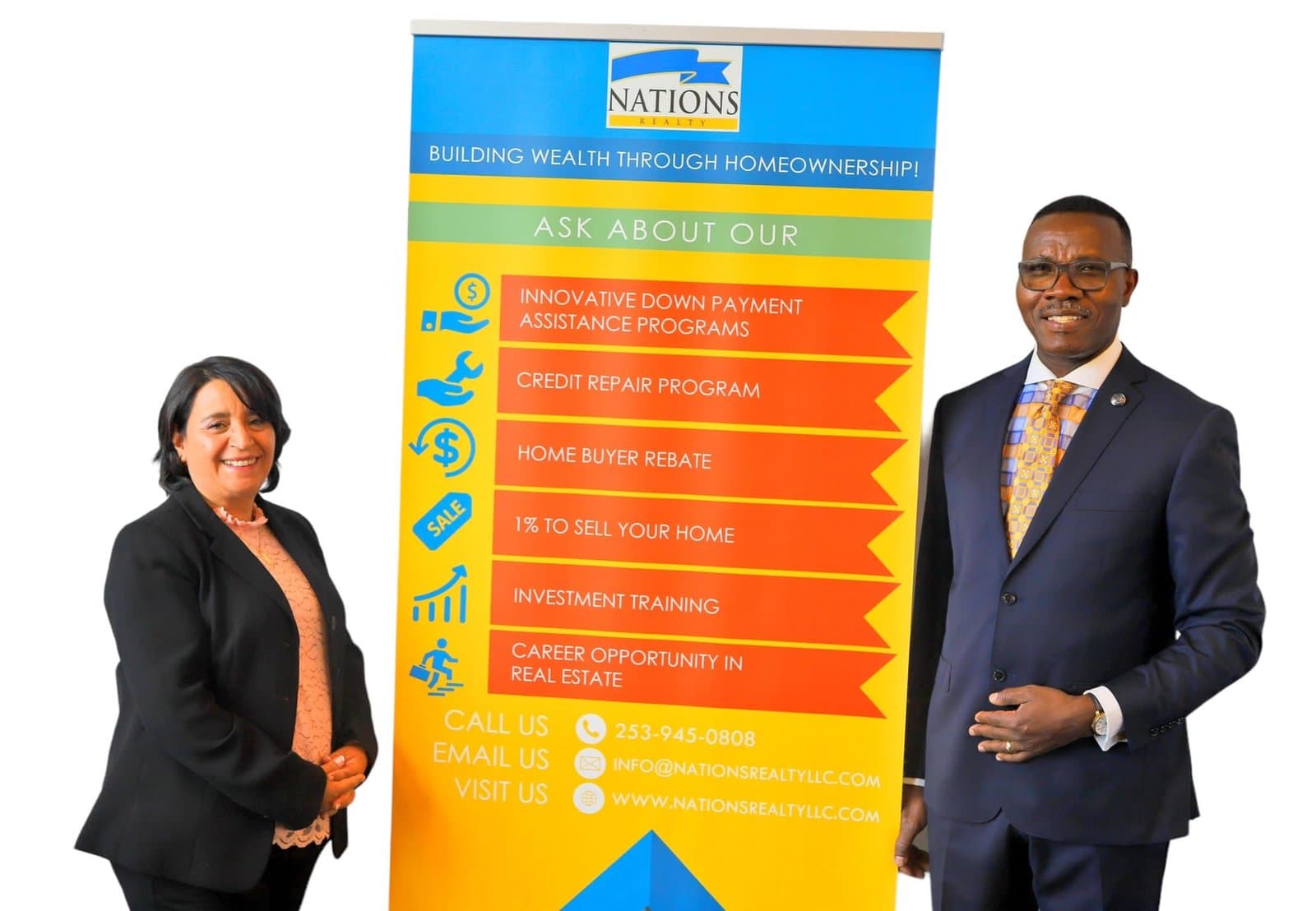 Nations Realty representatives beside a homeownership services display